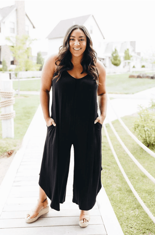6 Ways to Style A Classic Black Jumpsuit